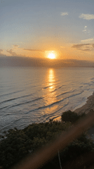 Golden light over calm water, Castellammare del Golfo coast