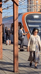 Early morning commuters wait at Khimki train station