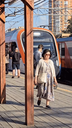 Early morning commuters wait at Khimki train station