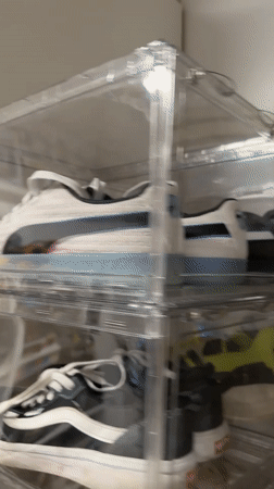 Organized shoe collection displayed in clear storage unit