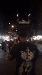 Mumbai religious district bustling with evening activity