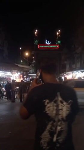 Mumbai religious district bustling with evening activity
