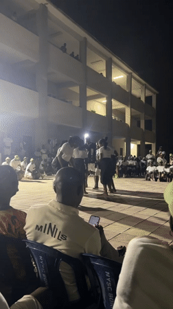 Traditional performance captured at nighttime gathering in Maiduguri, Nigeria