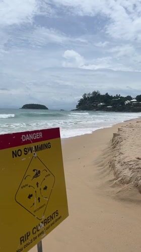 Beach safety sign warns of rip currents in Karon