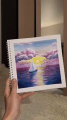 Artist creates sunset sailboat paintings in Perm studio session