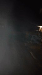 Nighttime street scenes captured showing illuminated building