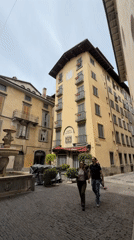 Sunday morning street life captured across historic Bergamo