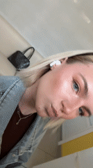 Woman records morning selfie videos in Saint Petersburg apartment