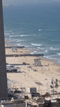 Morning beach activity captured in Bat Yam, Israel
