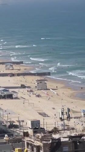 Morning beach activity captured in Bat Yam, Israel