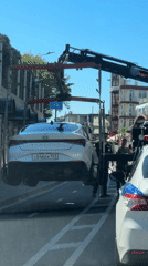 Vehicle towed on sunny afternoon in Sochi