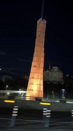 Illuminated Monument Displays Shifting Colors in Tbilisi Evening