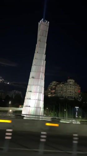 Illuminated Monument Displays Shifting Colors in Tbilisi Evening