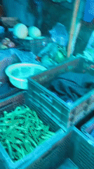 Morning activity along mountain roads and a roadside market