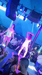 Dance duo performs at Varna nightclub under colorful lights