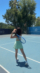 Woman films tennis content at Tel Aviv court