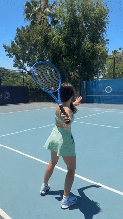 Woman films tennis content at Tel Aviv court