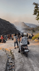 Landfill fire draws crowd in Surakarta as smoke fills the sky