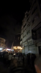Emergency response draws crowds after building damage in Gaza