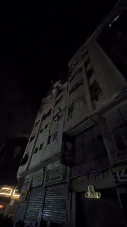 Emergency response draws crowds after building damage in Gaza