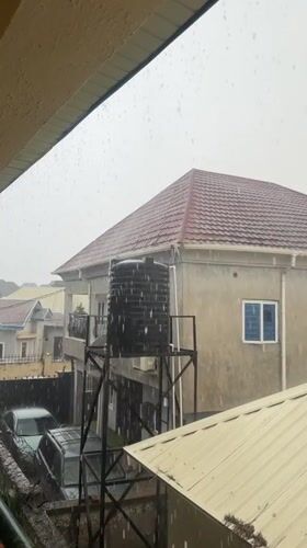Heavy rainfall hits Abuja residential neighborhoods during afternoon hours