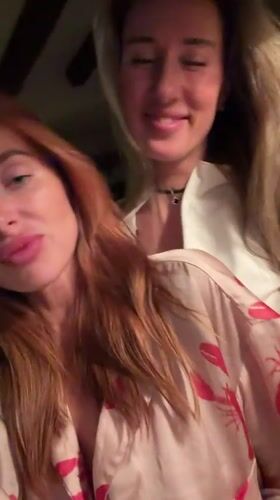 Two women filmed indoors in Krasnoyarsk, Russia