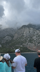 Beach visitors document coastal scenes near Kumluca, Turkey