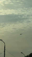Helicopter spotted flying through cloudy skies over Nizhny Novgorod