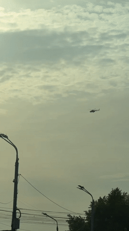 Helicopter spotted flying through cloudy skies over Nizhny Novgorod