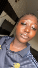 Woman takes selfies in casual street setting