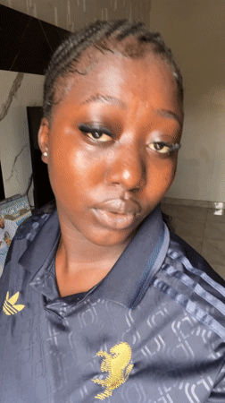 Woman takes selfies in casual street setting