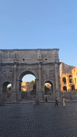 Golden hour at the Colosseum and Arch of Constantine, Rome