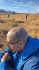 Man displays elaborate skull tattoo in Ushuaia, Argentina