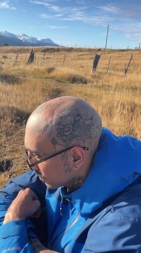 Man displays elaborate skull tattoo in Ushuaia, Argentina