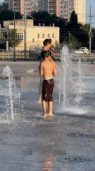 Splash pad afternoon at a public plaza in Orenburg