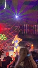 Late-night club performance under colored stage lights in Alanya.