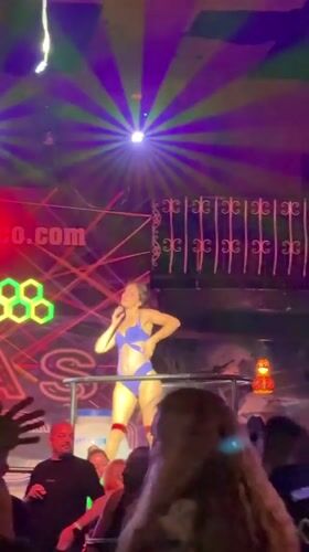 Late-night club performance under colored stage lights in Alanya.