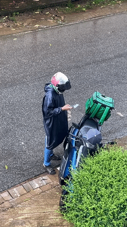 Heavy rain floods Kathu streets, delivery drivers work through storm