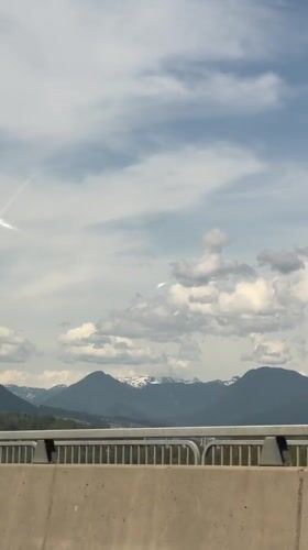 Driver records scenic bridge view in Coquitlam