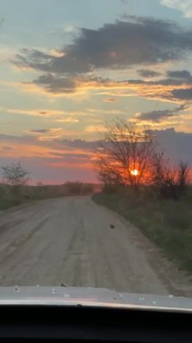 Sunset captured on dirt road near Kamyshin, Russia