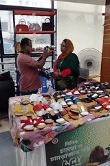 Dhaka leather and footwear fair, stalls busy with vendors and browsers