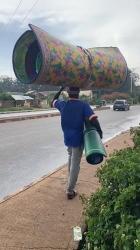 Daily street life observed in Bukuru, Nigeria sidewalks