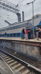 Ordinary city life: trains, traffic, Orthodox church documented
