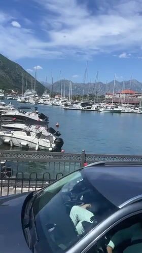 Leisure activity observed at Kotor marina on sunny morning