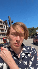 Man photographed in casual portrait session in Budva
