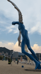 Colorful winged sculptures on a Yantian beach, September morning