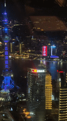 Pudong skyline at night, Oriental Pearl Tower glowing