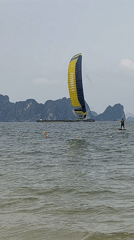 Morning water sports and beach activities in Vietnamese coastal ward