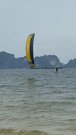 Morning water sports and beach activities in Vietnamese coastal ward