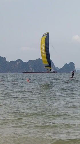 Morning water sports and beach activities in Vietnamese coastal ward